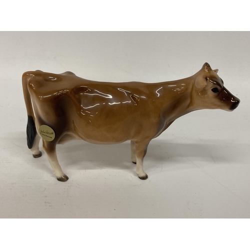 824 - A JOHN BESWICK JERSEY COW FIGURE WITH A GLOSS FINISH