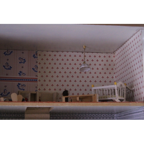 591A - A WOODEN DOLLS HOUSE WITH A QUANTITY OF FURNITURE AND FIGURES