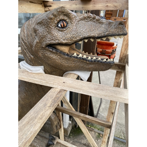 1501 - A LARGE FIBRE GLASS RAPTOR DINOSAUR (H:150CM L:225CM)