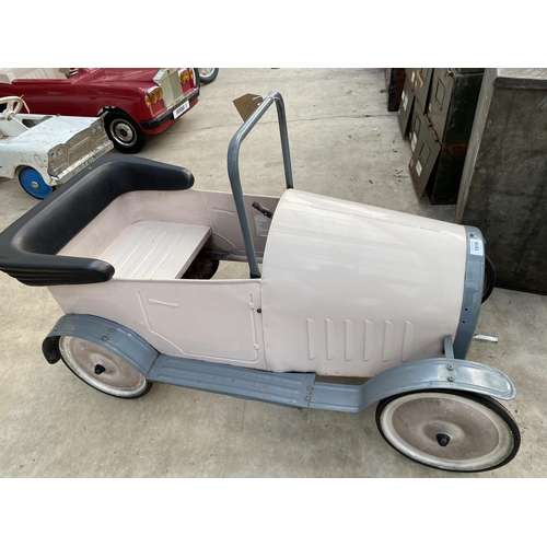 1510 - A VINTAGE PINK PEDAL CAR