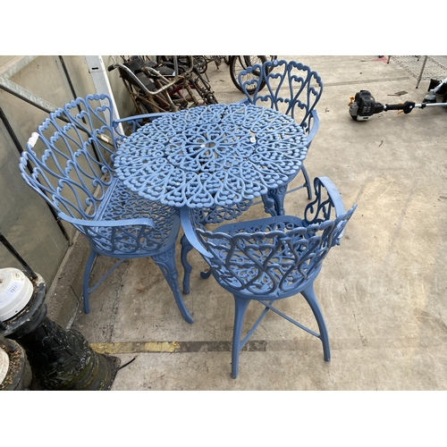 1516 - A DECORATIVE PATIO BISTRO SET COMPRISING OF A ROUND TABLE, A SMALL BENCH AND TWO CARVER CHAIRS