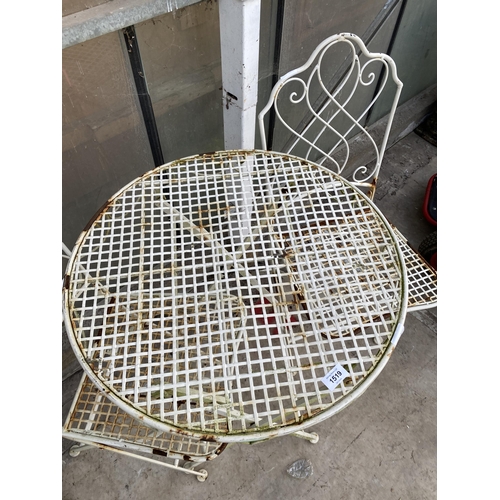 1519 - A METAL FOLDING BISTRO SET COMPRISING OF A ROUND TABLE AND TWO CHAIRS