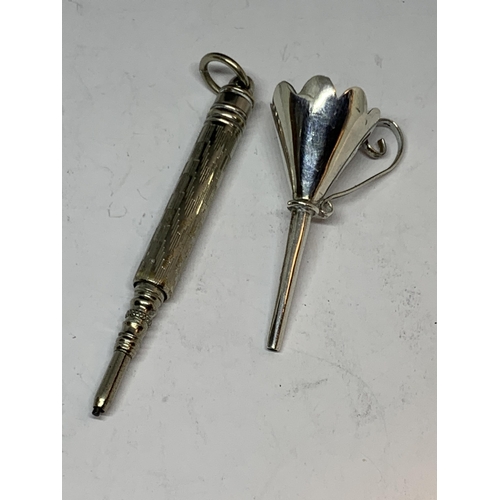 46 - A VINTAGE CHATELAINE WITH A PROPELLING PENCIL AND A FUNNEL