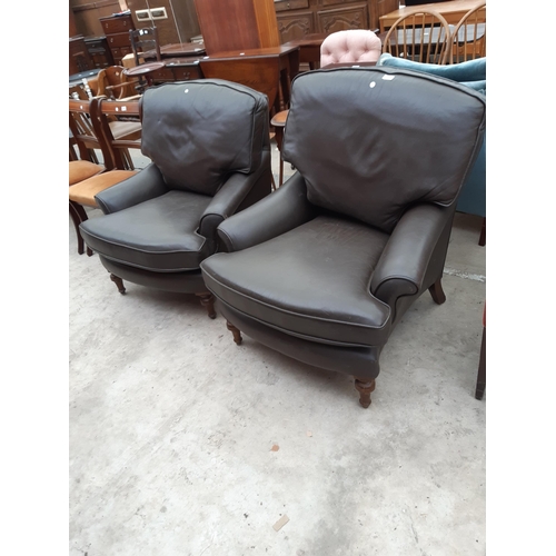 2540 - A PAIR OF JAMESON SEATING BROWN LEATHER EASY CHAIRS ON TURNED FRONT LEGS