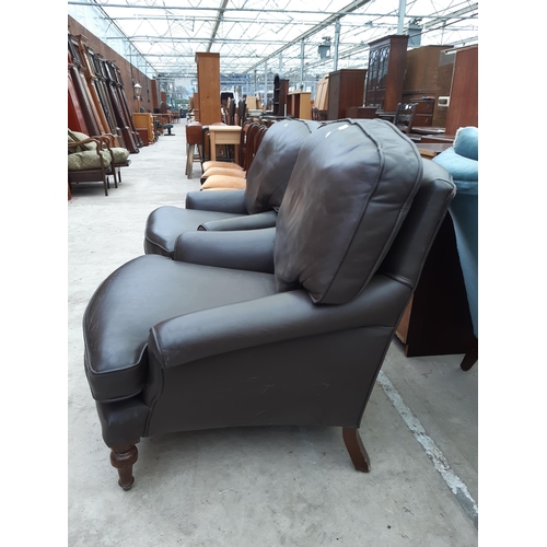 2540 - A PAIR OF JAMESON SEATING BROWN LEATHER EASY CHAIRS ON TURNED FRONT LEGS