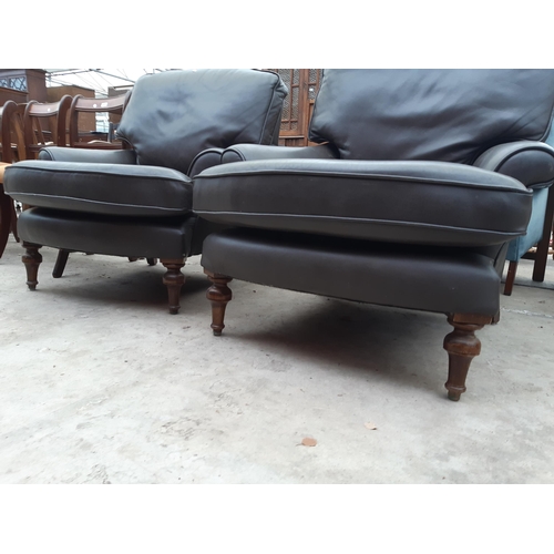 2540 - A PAIR OF JAMESON SEATING BROWN LEATHER EASY CHAIRS ON TURNED FRONT LEGS