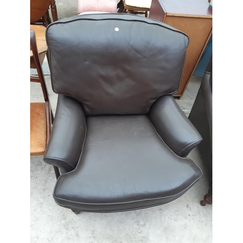 2540 - A PAIR OF JAMESON SEATING BROWN LEATHER EASY CHAIRS ON TURNED FRONT LEGS