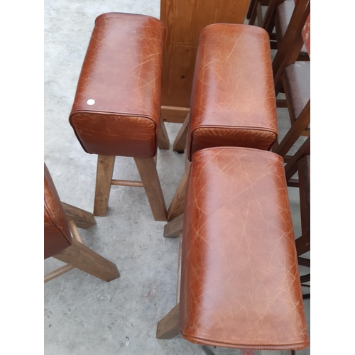 2544 - A SET OF FOUR BROWN LEATHER POMMEL HORSE BAR STOOLS