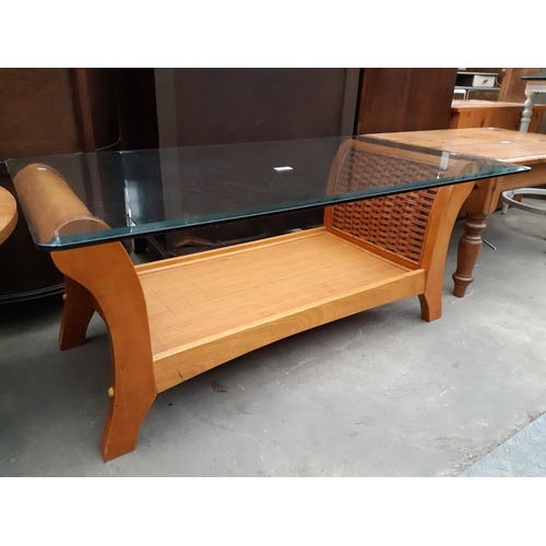 2627 - A HARDWOOD AND RATTAN COFFEE TABLE WITH GLASS TOP, 42