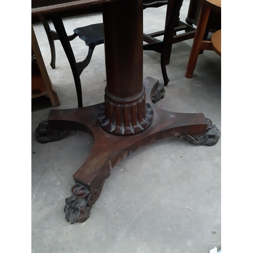 2629 - A VICTORIAN ROSEWOOD FOLD OVER GAMES TABLE ON CLAW FEET, 36