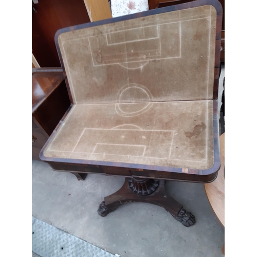 2629 - A VICTORIAN ROSEWOOD FOLD OVER GAMES TABLE ON CLAW FEET, 36