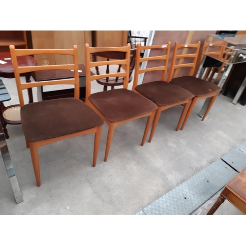 2633 - A SET OF FOUR RETRO TEAK SCHREIBER DINING CHAIRS