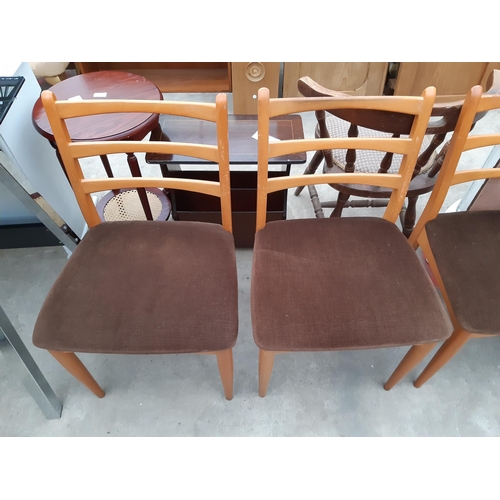 2633 - A SET OF FOUR RETRO TEAK SCHREIBER DINING CHAIRS