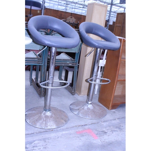 2966 - A PAIR OF PUMP ACTION STOOLS