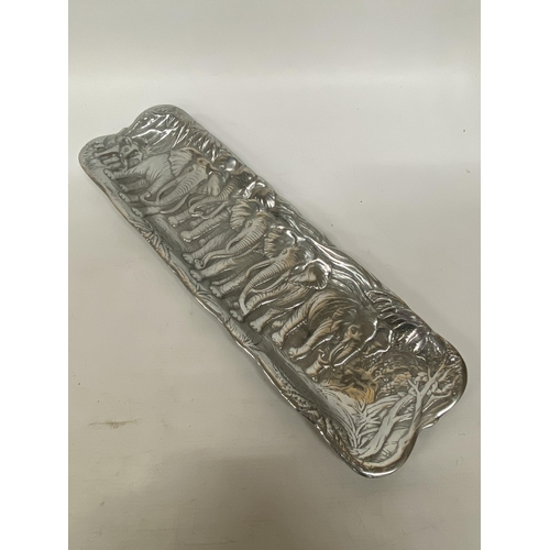 104 - A CAST ALUMINIUM ELEPHANT RELIEF TRAY, MADE IN MEXICO, LENGTH 48CM, WIDTH 15CM, HEIGHT 2CM