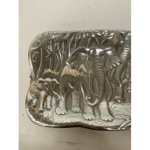 104 - A CAST ALUMINIUM ELEPHANT RELIEF TRAY, MADE IN MEXICO, LENGTH 48CM, WIDTH 15CM, HEIGHT 2CM