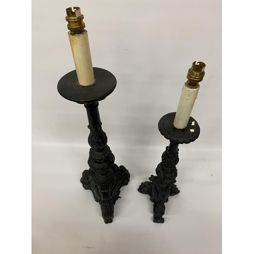 112 - TWO GOTHIC STYLE CANDLESTICKS/LAMPS HEIGHT 70CM AND 61CM