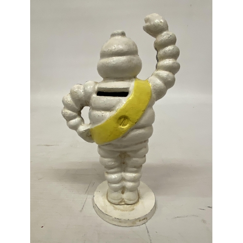 132 - A CAST MICHELIN MAN MONEY BOX, HEIGHT 17CM