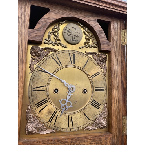 1544 - AN OAK CASED MANTLE CLOCK BEARING THE PLAQUE ALAN FOX WESTON IN ARDEN