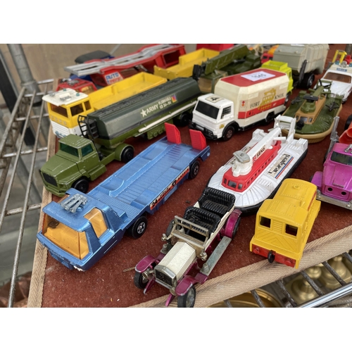 1545 - A LARGE ASSORTMENT OF DIECAST VEHICLES TO INCLUDE A DINKY BIN LORRY AND VARIOUS MATCHBOX VEHICLES