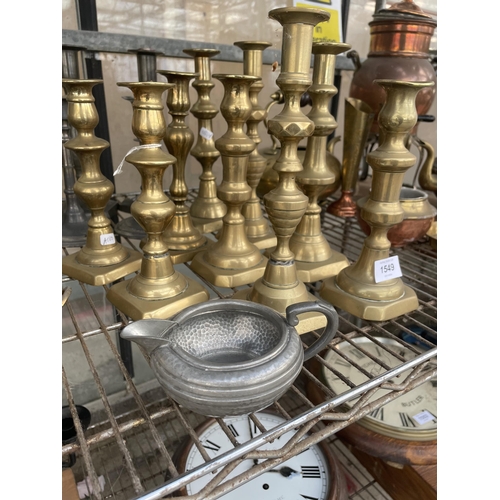 1549 - A LARGE QUANTITY OF BRASS AND SILVER PLATED CANDLE STICKS