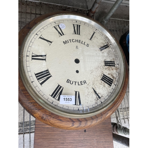 1553 - A VINTAGE OAK CASED MITCHELLS & BUTLER WALL CLOCK