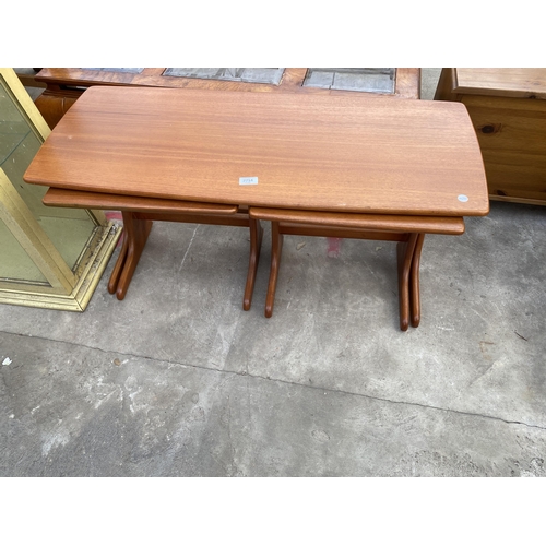 2751 - A RETRO TEAK NEST OF THREE TABLES