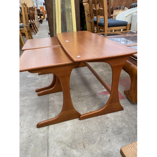 2751 - A RETRO TEAK NEST OF THREE TABLES