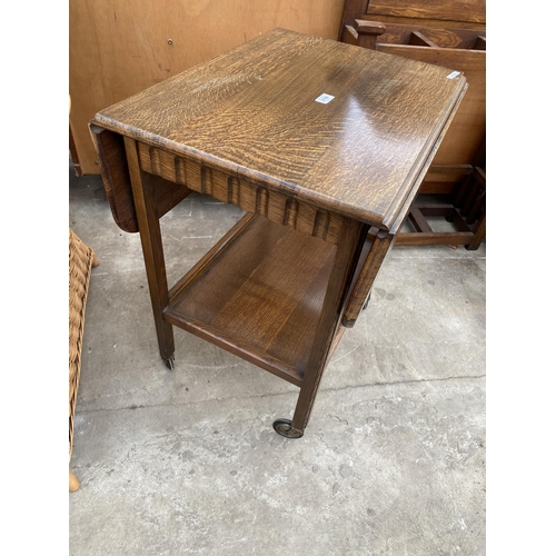 2768 - A MID 20TH CENTURY OAK TWO TIER DROP LEAF TROLLEY