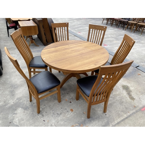 2772 - AN OAK EXTENDING DINING TABLE, 47