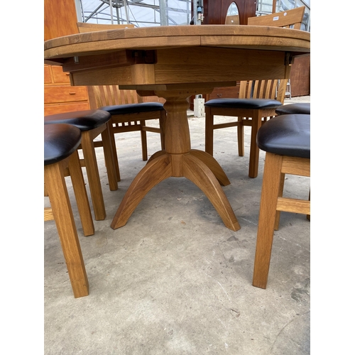 2772 - AN OAK EXTENDING DINING TABLE, 47