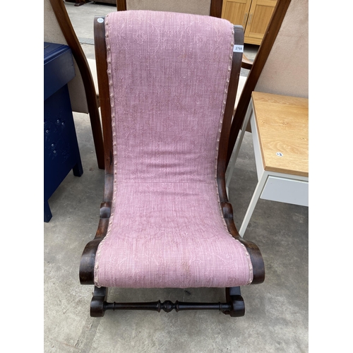 2788 - A VICTORIAN MAHOGANY X FRAME NURSING CHAIR WITH TURNED STRETCHERS (COVERED WITH LAURA ASHLEY FABRIC)