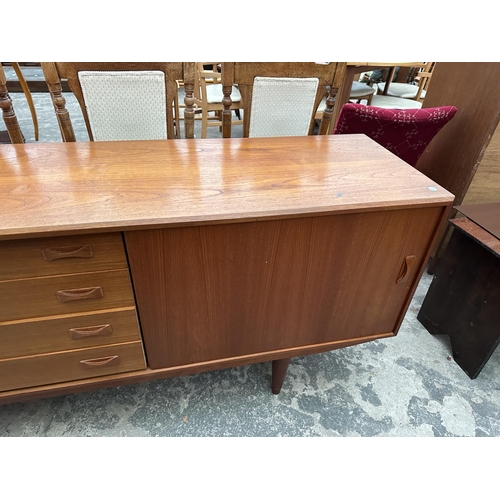 2806 - A RETRO TEAK CLAUSEN & SON (SILKBORG) SIDEBOARD WITH TWO SLIDING DOORS AND FOUR DRAWERS, 82