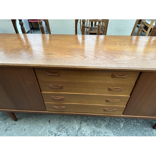 2806 - A RETRO TEAK CLAUSEN & SON (SILKBORG) SIDEBOARD WITH TWO SLIDING DOORS AND FOUR DRAWERS, 82