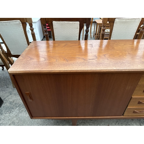 2806 - A RETRO TEAK CLAUSEN & SON (SILKBORG) SIDEBOARD WITH TWO SLIDING DOORS AND FOUR DRAWERS, 82