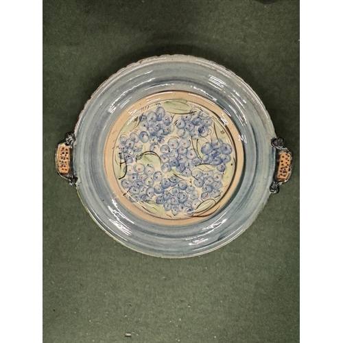 48 - A LARGE STUDIO POTTERY TWIN HANDLED GLAZED SERVING PLATE 57.5CM X 50CM