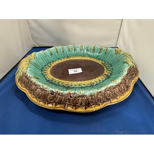 54 - A LATE 19TH CENTURY MAJOLICA BREAD PLATE WITH THE MOTTO 'WHERE REASON RULES THE APPETITIE OBEYS'