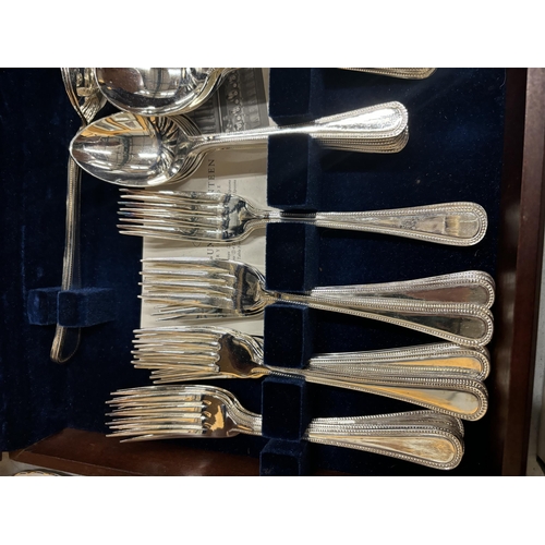 58 - A VINERS FIFTY EIGHT PIECE CANTEEN OF CUTLERY WITH EXTRA ITEMS