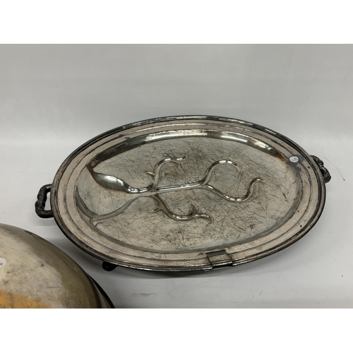 6 - A LARGE VINTAGE SILVER PLATED MEAT SERVING PLATTER, FOOTED WITH MONOGRAMED DOME