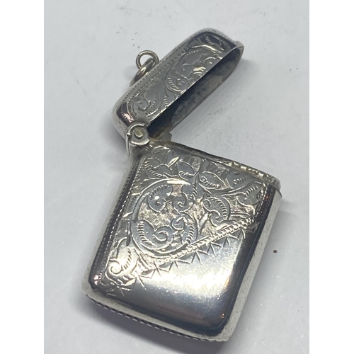 615 - A HALLMARKED (INDISTINCT) SILVER VESTA CASE