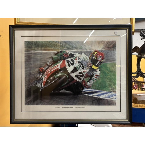 63 - THREE FRAMED SIGNED ITEMS TO INCLUDE PHOTOGRAPHS OF CARL FOGARTY AND COLIN EDWARDS (VENDOR REPORTS T... 