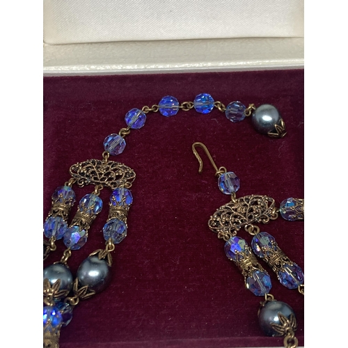 641 - A VICTORIAN STYLE THREE STRAND BLUE GLASS AND BEAD NECKLACE IN A KENDAL MILNE MANCHESTER PRESENTATIO... 