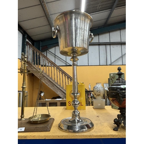 67 - A CHROME CHAMPAGNE BUCKET ON A STAND