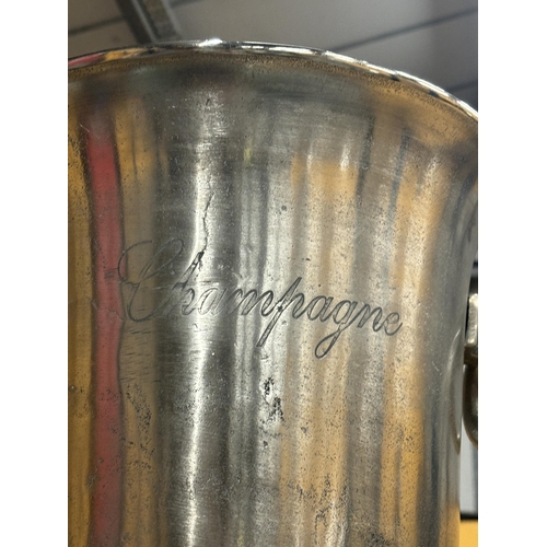 67 - A CHROME CHAMPAGNE BUCKET ON A STAND