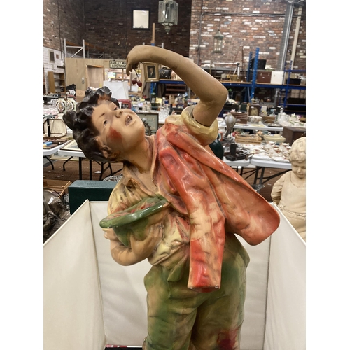 72 - A LARGE CHALK FIGURINE OF A BOY - CHERRY PICKING