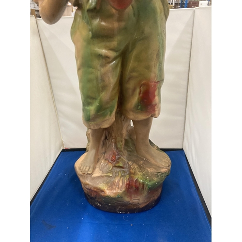 72 - A LARGE CHALK FIGURINE OF A BOY - CHERRY PICKING