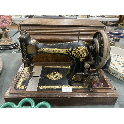 81 - A VINTAGE SINGER SEWING MACHINE WITH CASE