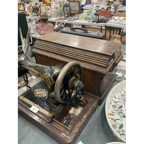 81 - A VINTAGE SINGER SEWING MACHINE WITH CASE