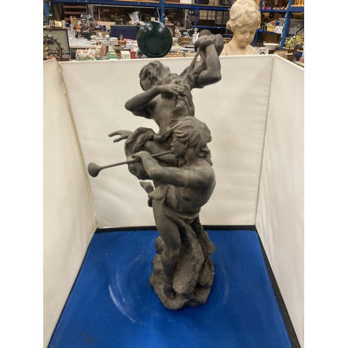 85 - A LARGE RESIN SCULPTURE OF THE PIPERS