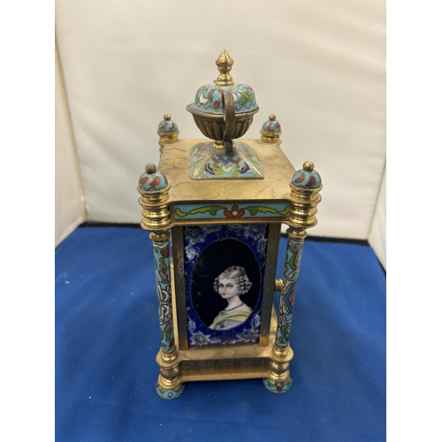 94 - A DECORATIVE CLOISONNE MECHANICAL MANTEL CLOCK